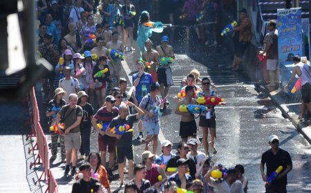 Hottest spot in Bangkok! Silom Road is packed with tourists flocking to celebrate the last day of Songkran.